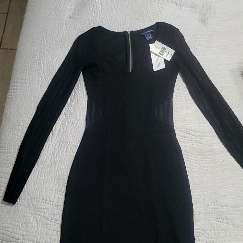 French connection, little black dress,zipper up the back, lace on the arms,waist